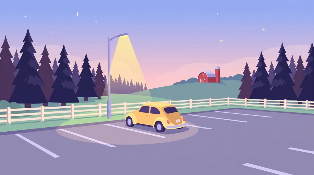 Small car in an empty lot at dusk